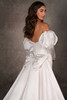 Back view of D4369 bridal gown featuring oversized detachable bow train