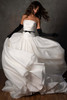 Front view of D4454 flowing organza ball gown with dramatic movement