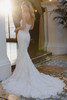 Back view of D4541 lace fit-and-flare gown with scalloped train