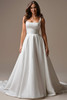 Front view of Galina A-line wedding gown with empire waistband and pockets