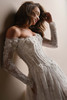 Detail view of Kitaro off-the-shoulder long sleeves with pearl accented 3D flowers