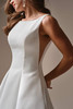 Detail view of Lawrence satin wedding dress with high bateau neckline and tank straps