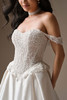 Detail view of London sweetheart bodice with beaded lace and tiered hip peplums