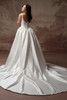 Back view of Melissa Marie satin dress with covered buttons and train