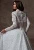 Back view of Serena lace dress with long sleeves and covered buttons
