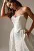 Detail view of Wyntelle basque waist corset and beaded lace dress