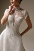 Close front view of Angelica showing beaded lace jacket with pearl accents