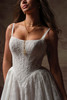 Close front view of Ivandra dress showing square neckline and basque waist