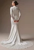 Back view of Lovai long sleeve wedding dress with extended illusion lace train