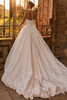 Back view of Baretty dress showing corset bodice and textured train