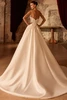 Back view of Baudy dress with voluminous A-line skirt and train