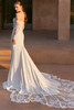 Back view of Catryl dress with detachable sleeves and scalloped lace train