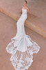 Back view of Catryl dress highlighting covered buttons and lace train