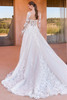 Back view of Cetryn dress with covered buttons and lace train