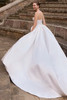 Back view of Etaga detachable overskirt and lace wedding dress