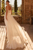 Back view of Katzey semi-sheer corset and flowing tulle dress