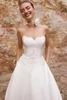 Close view of Leafra sweetheart neckline and beaded lace dress