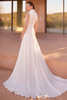Back view of Milora dress showing high neckline and flowing train