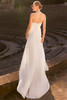 Back view of Theais strapless chiffon wedding dress with flowing sheath skirt