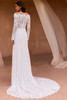 Back view of Velyne dress showing illusion lace back and covered buttons