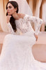 Detail view of Velyne dress with bateau neckline and sheer corset bodice