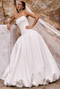 Front view of Vermelia dress with straight neckline and voluminous satin skirt