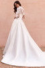 Back view of Virella dress showing detachable lace bolero and Mikado train