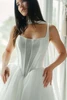 Bodice detail of Stella York SY8222 with architectural seaming and angled basque waist