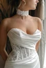 Bodice detail of SY8248 wedding dress with draped satin and peekaboo lace corset
