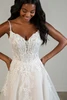 Bodice detail of SY8293 dress with beaded straps and floral lace appliqués