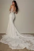 Back view of SY8340 dress with open back and lace-cutout train