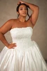 Detail view of D4546 dress showing crystal beaded lace corset bodice and basque waist