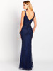 Back view of navy gown with V-back and elegant sheer overlay