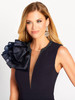 Shimmering floral shoulder accent meets beaded neckline and illusion plunge