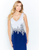 Embroidered leaf appliqué defines the waist on this crisp colorblock design