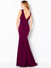 Deep V-back with fabric-covered buttons creates elegant rear detail and flare