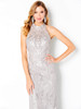 Intricate sequin scrollwork and mock neck add elegant structure to this sleeveless design