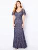 Gown with sequin accents and tulle flutter sleeves offers elegant shimmer