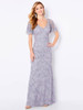 Gown sparkles with delicate sequin vine embroidery and sheer flutter sleeves