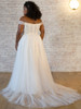 Illusion corset back flows into a dreamy layered chapel train