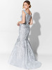 A sculpted V-back and softly flared train complete this regal silver embroidered silhouette