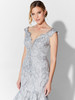 Scalloped trim and tonal beading highlight the plunge neckline for elegant evening glamour