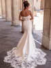 Back view of A1110 dress with scalloped lace train and covered buttons