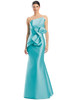 Luxe aqua satin drapes into a dramatic asymmetrical  bow cascade