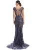 Buttoned illusion back flows into a sheer embellished train