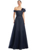 Classic navy A-line dress with elegant pleating and a structured floral shoulder accent