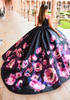 Back view of black floral quinceañera gown with dramatic skirt