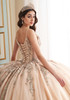 Side view of glitter tulle ball gown with detachable bow