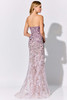 Botanical appliqués trail down the sheer train of this romantic strapless silhouette