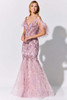 Dusty pink beadwork and airy feathers flow from the hem of this dazzling cold-shoulder gown